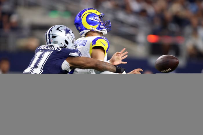 Dallas Cowboys linebacker Micah Parsons (11) attempts to sack Los Angeles Rams quarterback Matthew Stafford (9) in the second quarter at AT&T Stadium.